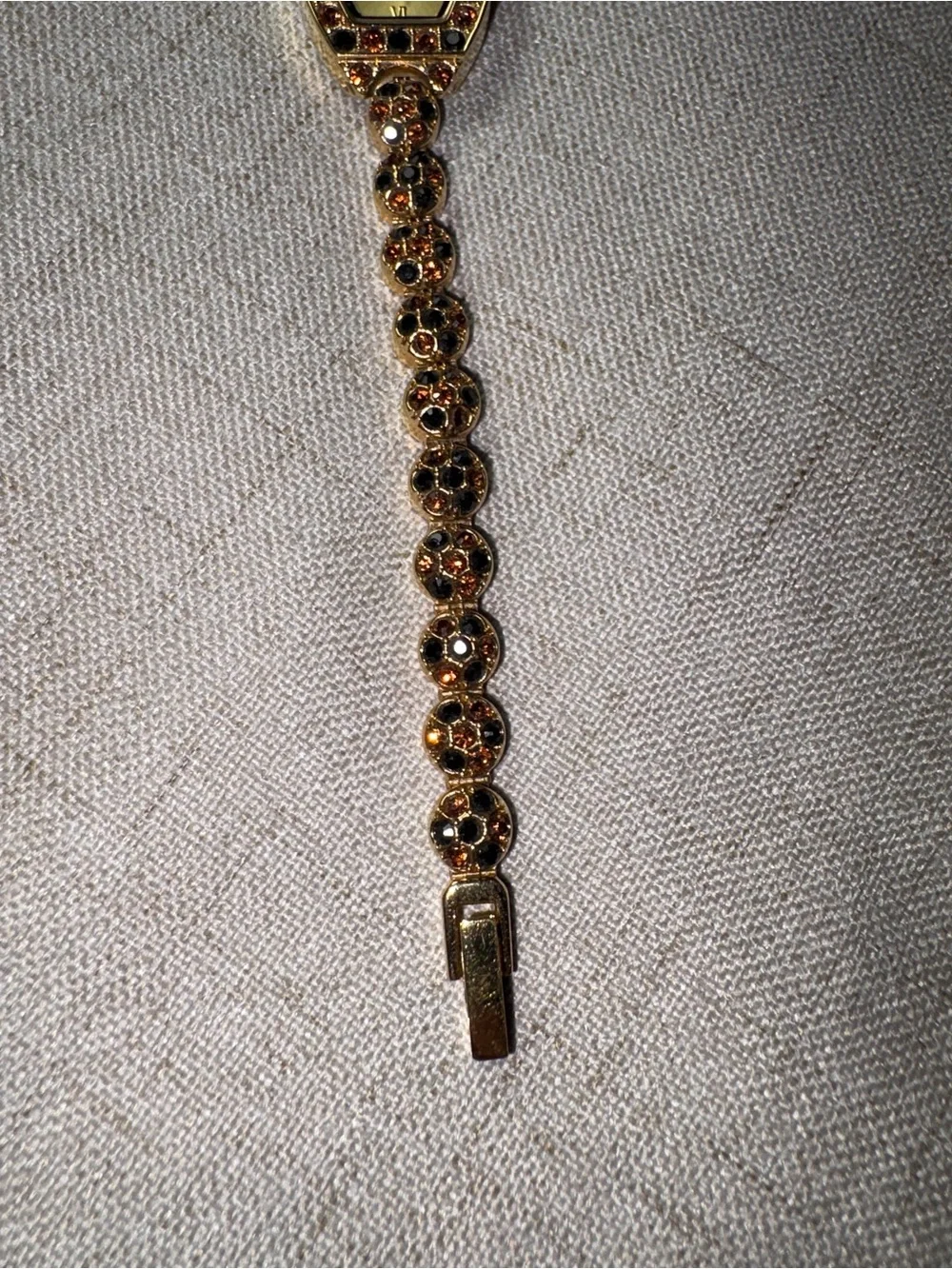 Gold-Tone Garnet Accent Womens Bracelet Watch